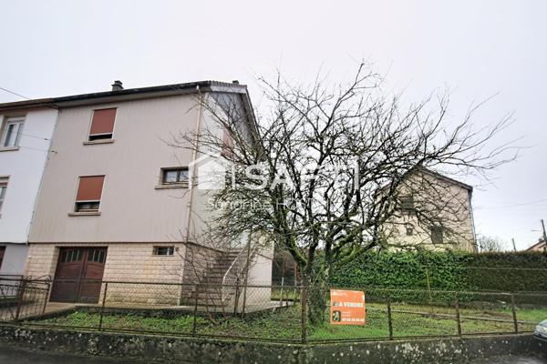 Maison jumelée avec jardin et garage