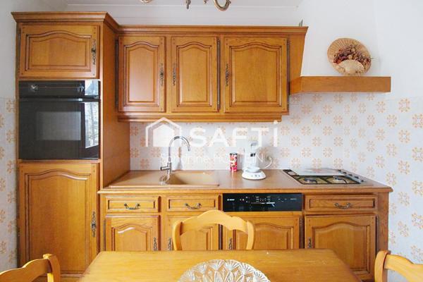 Maison jumelée avec jardin et garage