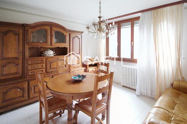 Maison jumelée avec jardin et garage