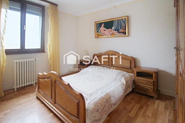 Maison jumelée avec jardin et garage