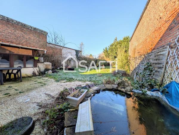 MAISON AVEC GARAGE ET JARDIN