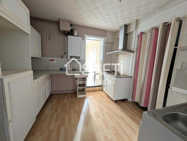 MAISON AVEC GARAGE ET JARDIN