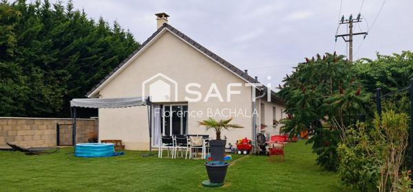 Charmante maison familiale de plain-pied de 85 m² avec garage attenant