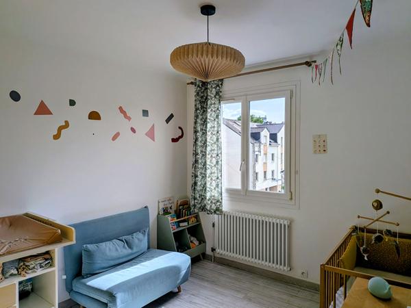 A vendre NANTES/ZOLA appartement 2 chambres/cave/double garage/ balcon Sud