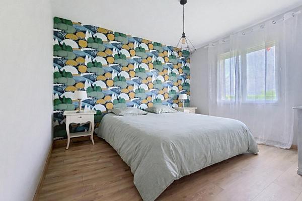 Maison familiale de plain pied de 2006 avec grande parcelle paysagée