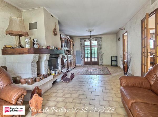 Maison sur sous-sol avec terrain arboré - Vernoil le Fourrier (49390)