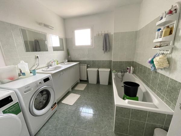 Maison 88 m² vendue avec locataire en place – 3 chambres, garage et jardin