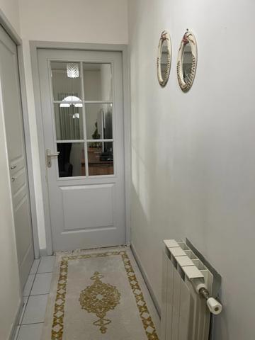 Maison 88 m² vendue avec locataire en place – 3 chambres, garage et jardin