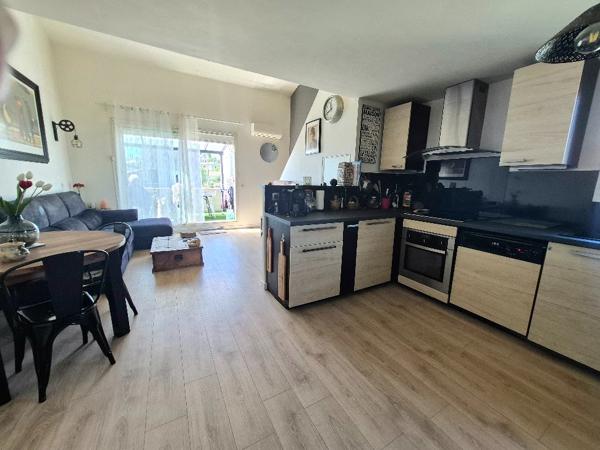 Appartement  3 pièce(s) 62 m2 avec terrasse et stationnement