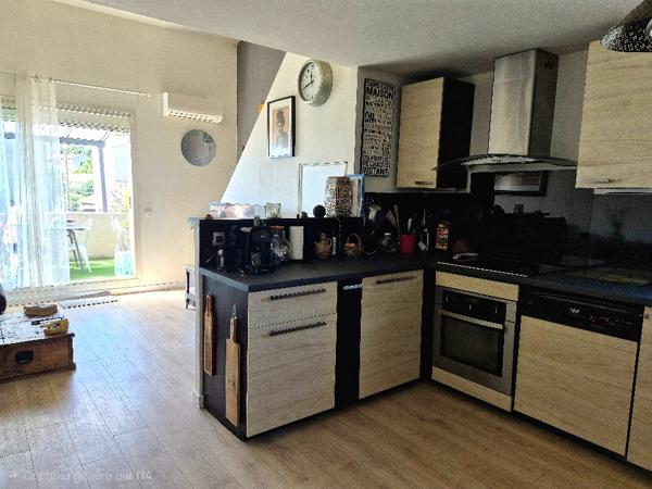 Appartement  3 pièce(s) 62 m2 avec terrasse et stationnement
