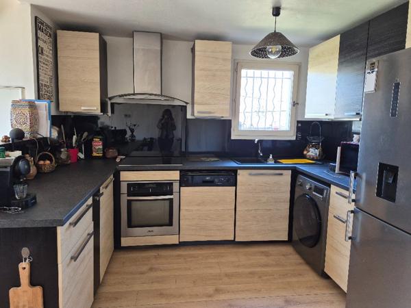 Appartement  3 pièce(s) 62 m2 avec terrasse et stationnement