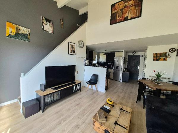 Appartement  3 pièce(s) 62 m2 avec terrasse et stationnement