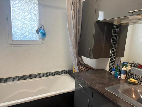 Appartement  3 pièce(s) 62 m2 avec terrasse et stationnement
