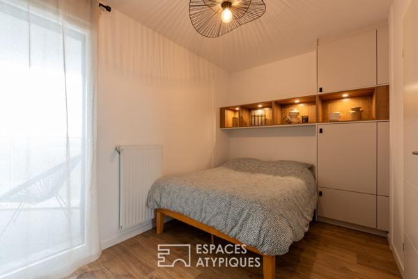 Appartement écrin contemporain en étage élevé