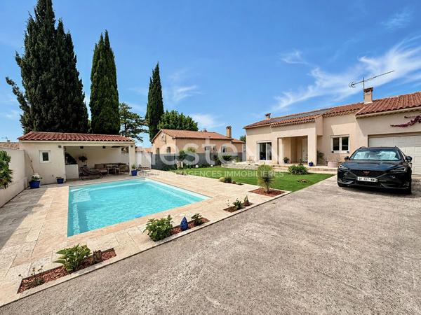 Maison T4 d'environ 115m² avec garage, jardin et piscine dans un lotissement sécurisé