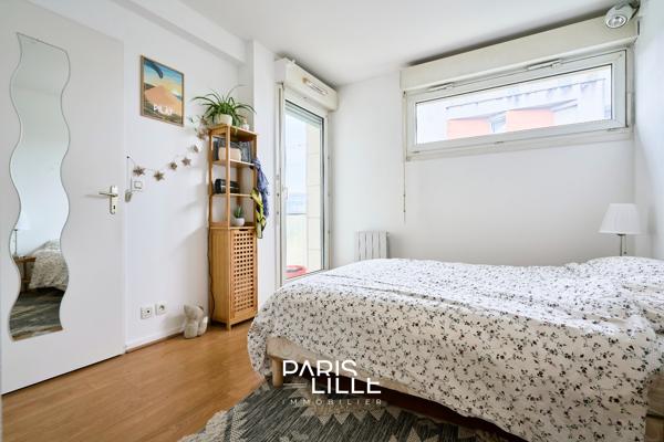 T2 proche centre et gare, balcon et parking.