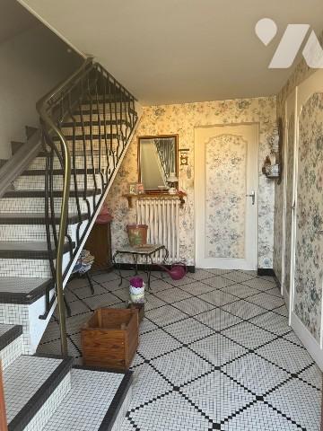 Pavillon sur sous-sol à proximité du centre-ville.