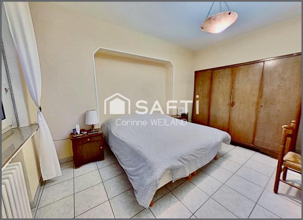 Maison familiale 6 chambres, terrain 11 ares, double garage, 2 appart. possibles, sous-sol complet.