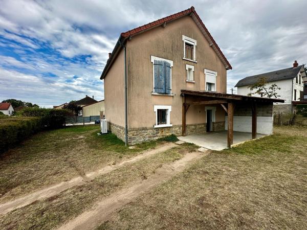Maison sur sous sol avec 3 chambres, carport et  un grand jardin