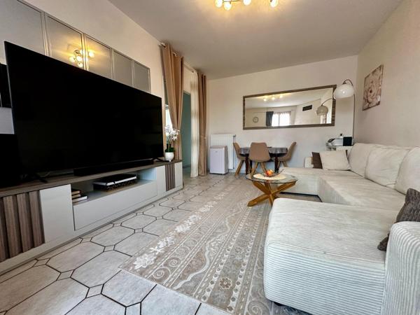 Maison sur sous sol avec 3 chambres, carport et  un grand jardin