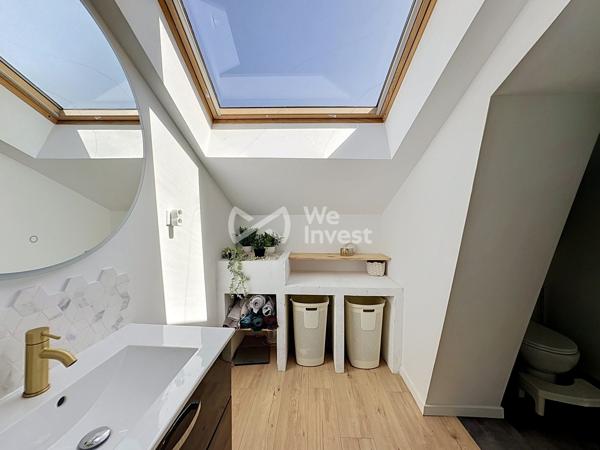 Maison de ville "coup de coeur" de 180 m2 avec garage de 145 m2.