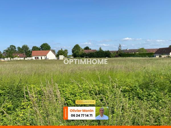 Au calme, cœur de village, terrain constructible et viabilisé de 848 m2
