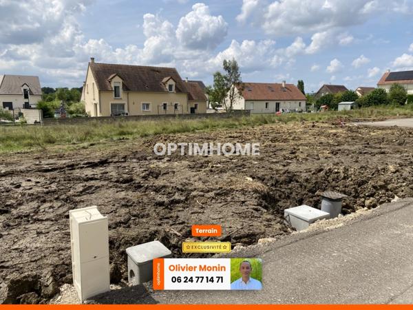 Au calme, cœur de village, terrain constructible et viabilisé de 848 m2
