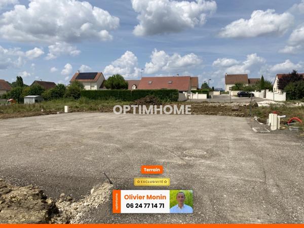 Au calme, cœur de village, terrain constructible et viabilisé de 848 m2