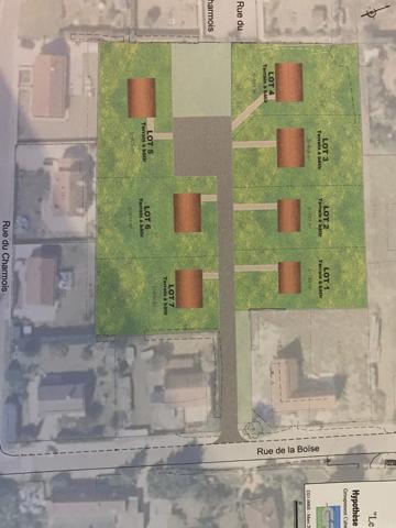 Au calme, cœur de village, terrain constructible et viabilisé de 848 m2