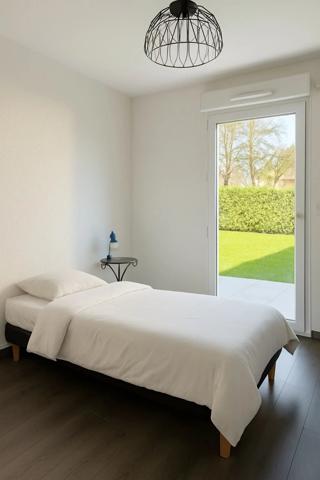 Appartement T3 en rez de jardin au centre Reignier-Esery