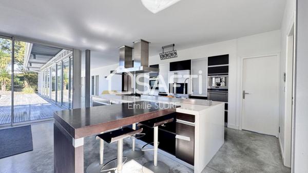 Maison familiale d’exception entre bassin et ville