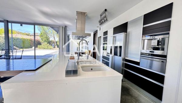 Maison familiale d’exception entre bassin et ville