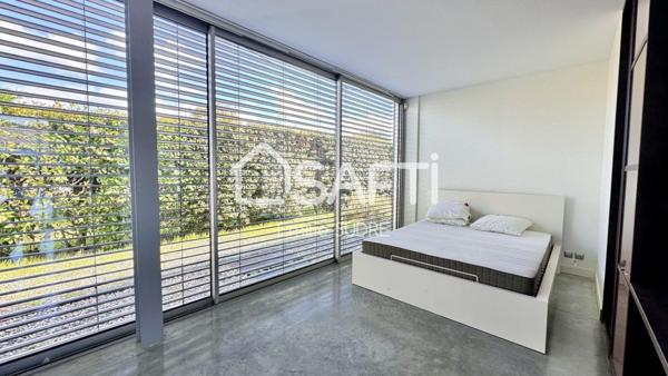 Maison familiale d’exception entre bassin et ville