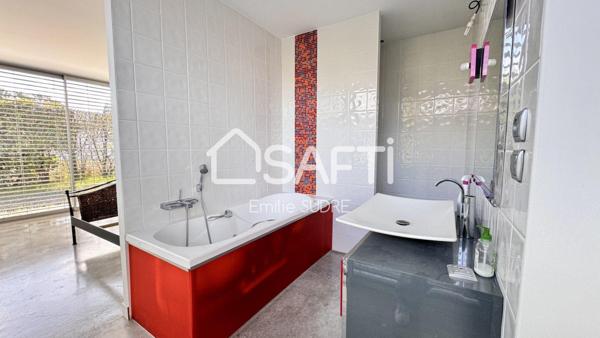 Maison familiale d’exception entre bassin et ville