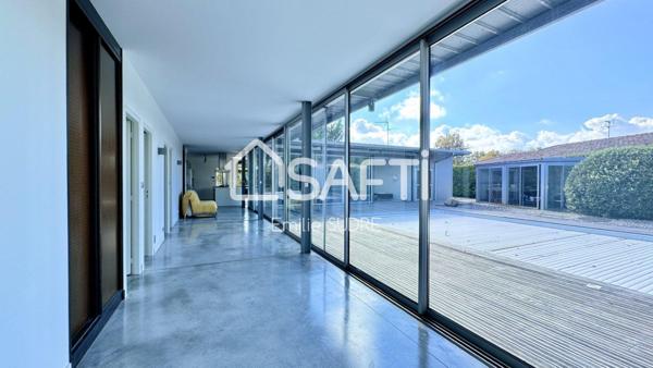 Maison familiale d’exception entre bassin et ville