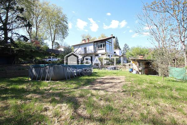 Maison traditionnelle - 4 chambres - Sous-sol 226m² et garage 35m²