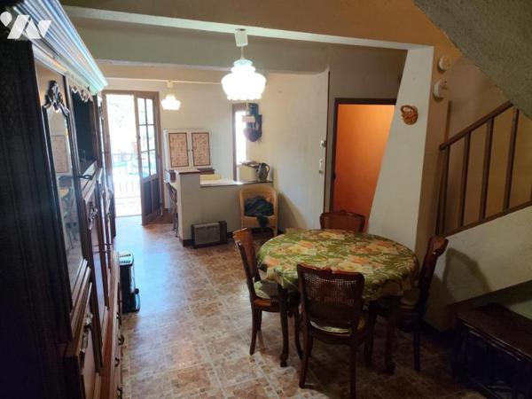 Maison de village avec garage et balcon