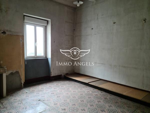 Immeuble bourgeois avec ascenseur – 400 m² exploitables – plein centre de Saint-Ambroix