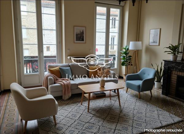 Immeuble bourgeois avec ascenseur – 400 m² exploitables – plein centre de Saint-Ambroix