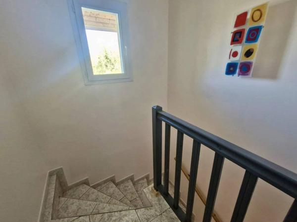 Maison mitoyenne avec atelier