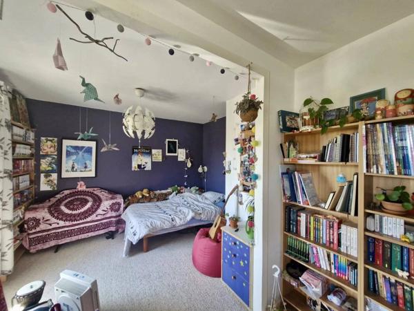 Maison mitoyenne avec atelier