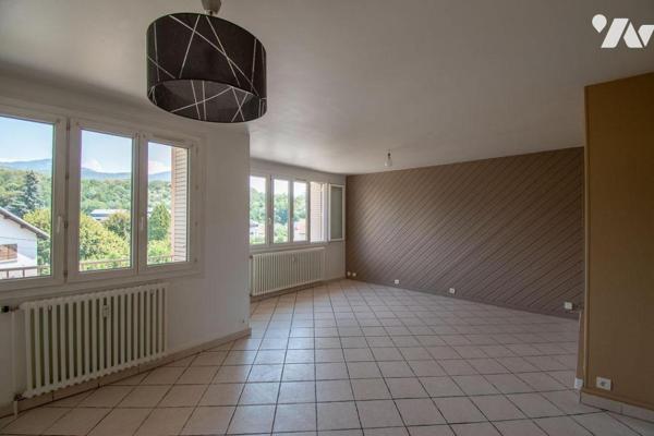 Appartement T3 traversant de 65,97 m² avec balcon et cave - Dernier Etage