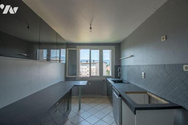 Appartement T3 traversant de 65,97 m² avec balcon et cave - Dernier Etage