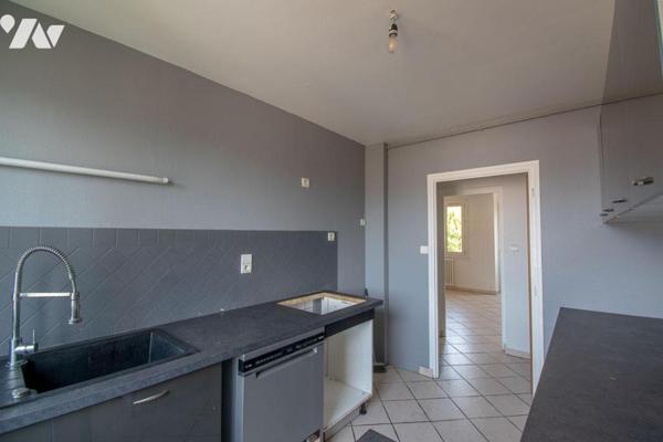 Appartement T3 traversant de 65,97 m² avec balcon et cave - Dernier Etage