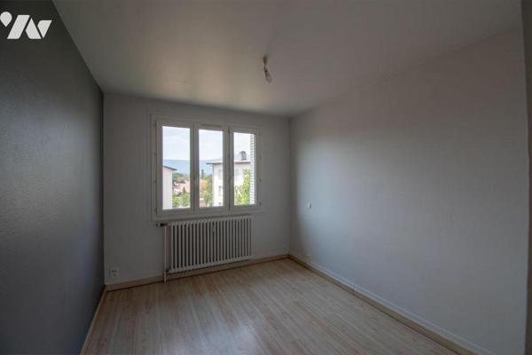 Appartement T3 traversant de 65,97 m² avec balcon et cave - Dernier Etage