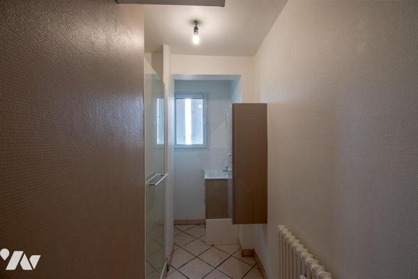Appartement T3 traversant de 65,97 m² avec balcon et cave - Dernier Etage