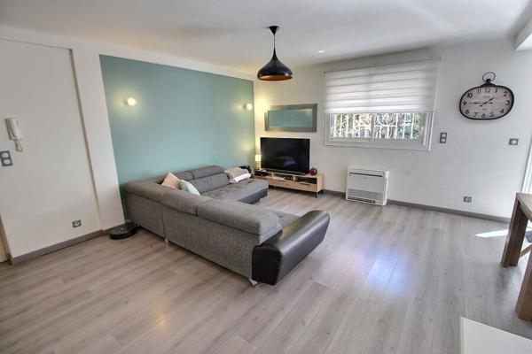 A VENDRE APPARTEMENT REZ-DE-CHAUSSEE DE 70.60 M² AVEC JARDIN, TERRASSE ET PARKING SECURISE