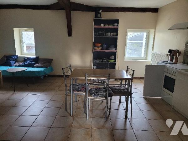 Immeuble de 4 logements et 1 local commercial