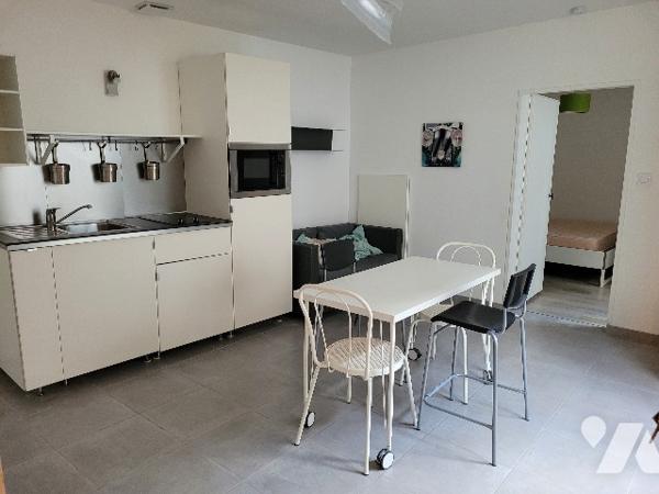 Immeuble de 4 logements et 1 local commercial