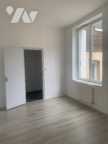 Immeuble de 4 logements et 1 local commercial